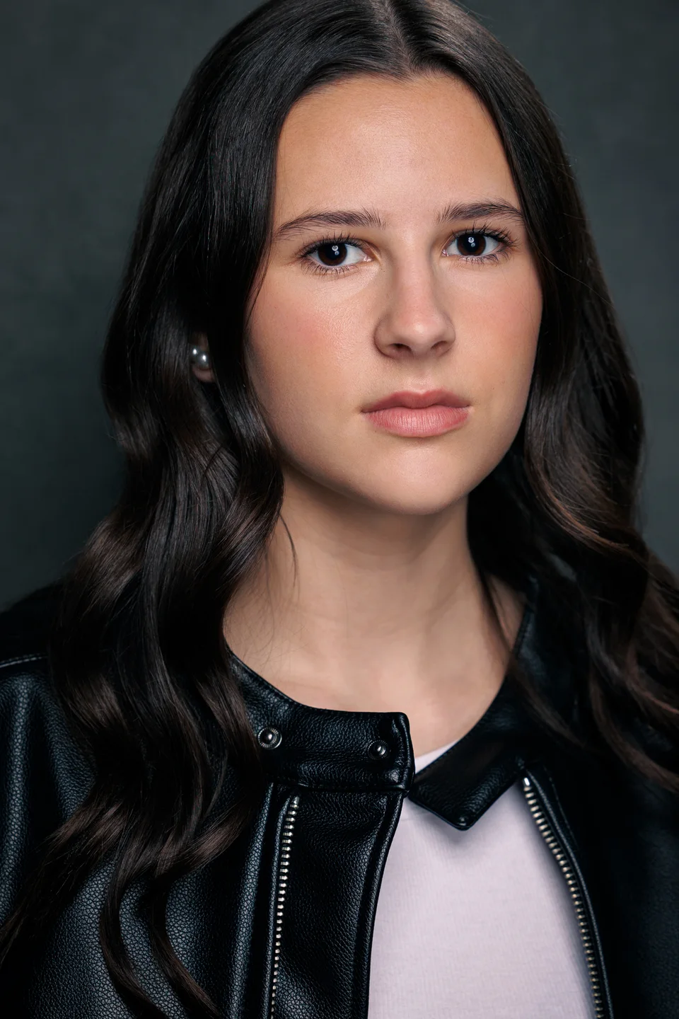 Ella Strickland in a black leather jacket