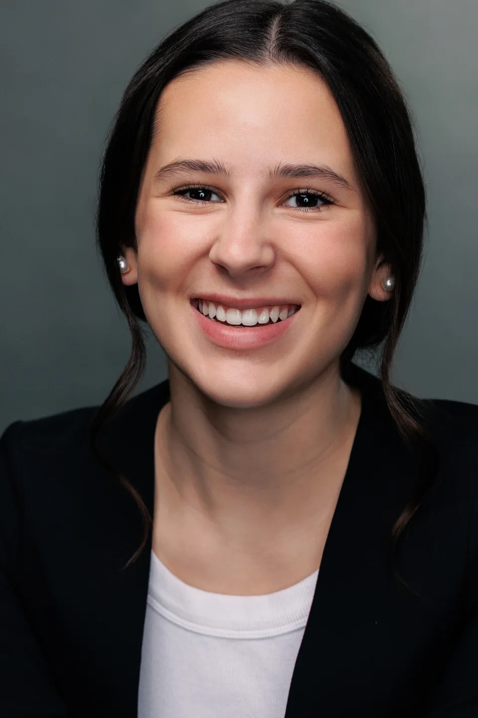 A smiling studio portrait of Ella